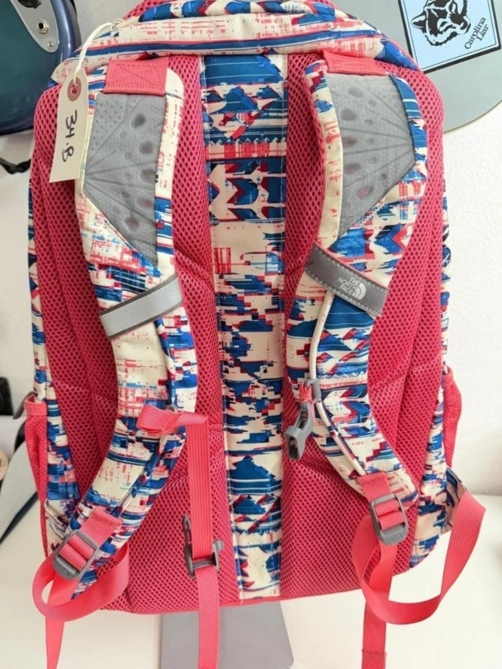 The North Face Patterned Jester Backpack in Coral and Blue